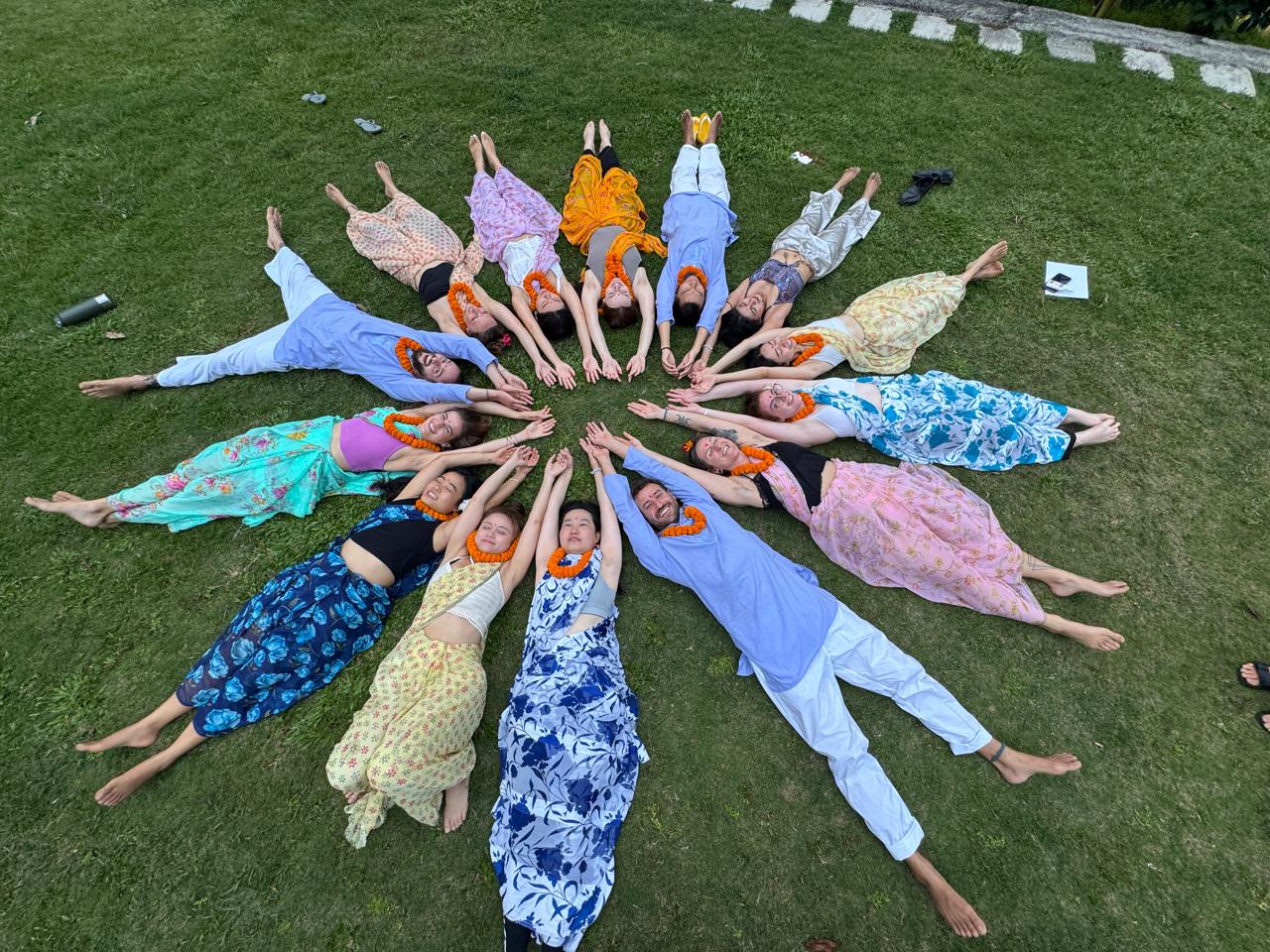 Students showing the certification after successful completion of 200 hour yoga teacher training in pokhara Nepal